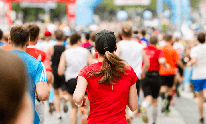 group of people running at a marathon